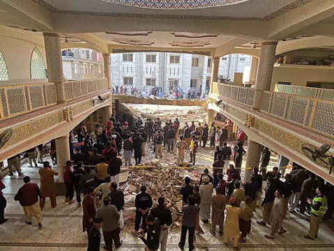 Security officials inspect the site of a mosque blast inside the police headquarters in Peshawar on January 30, 2023. At least 17 people were killed in a mosque blast at a police headquarters in Pakistan, a (1).