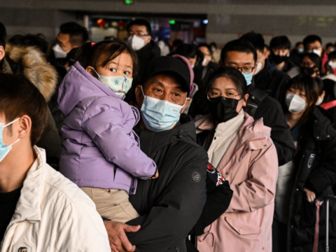 China says Covid outbreak has infected 80% of population