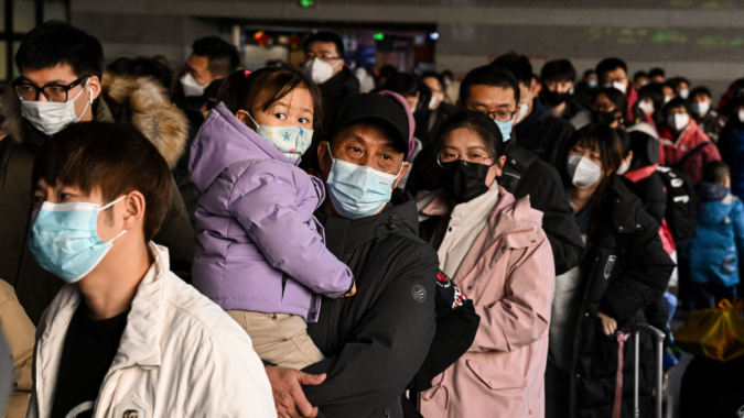 China says Covid outbreak has infected 80% of population