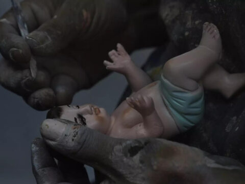 Broken baby Jesus statues flood restorers ahead of feast day