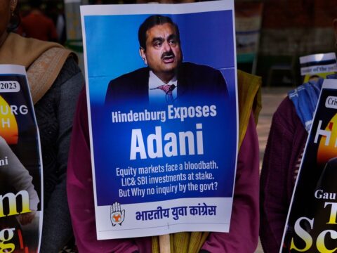 Adani in talks to prepay loans on shares, denies trimming capex: Report