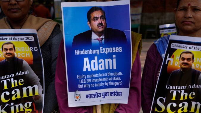 Adani in talks to prepay loans on shares, denies trimming capex: Report