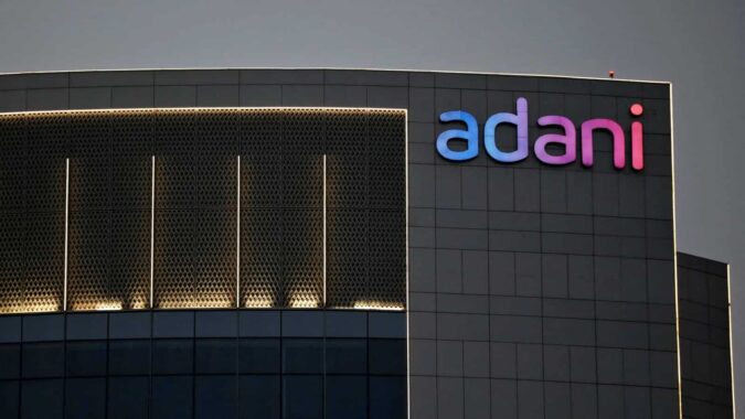 Adani Group's market value slips under $100 billion