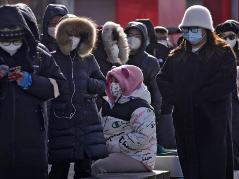 China says 200 million treated, pandemic 'decisively' beaten