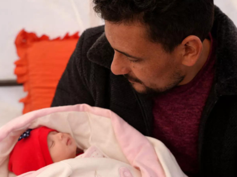 Syria: Syria family takes in 'miracle baby' born under quake rubble