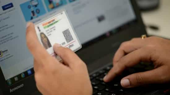 By linking the Aadhaar card to the ration card, the government will be able to prevent individuals from obtaining multiple ration cards. (Mint)