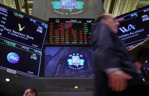 Traders work at the post where First Republic Bank stock is traded on the floor of the New York Stock Exchange (NYSE) in New York City.(REUTERS)