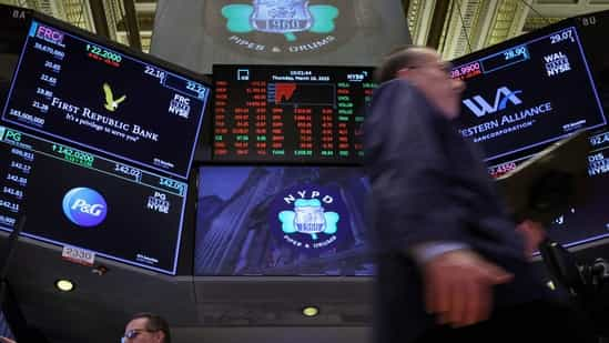 Traders work at the post where First Republic Bank stock is traded on the floor of the New York Stock Exchange (NYSE) in New York City.(REUTERS)