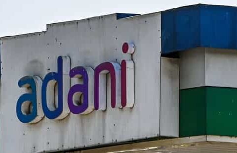 Signage of Adani Group at company's gas station in Ahmedabad.(Bloomberg)