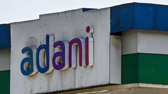 Signage of Adani Group at company's gas station in Ahmedabad.(Bloomberg)