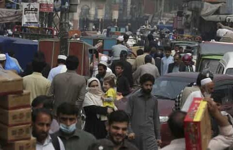 People visit a market to buy grocery and other stuff, in Peshawar.(AP)