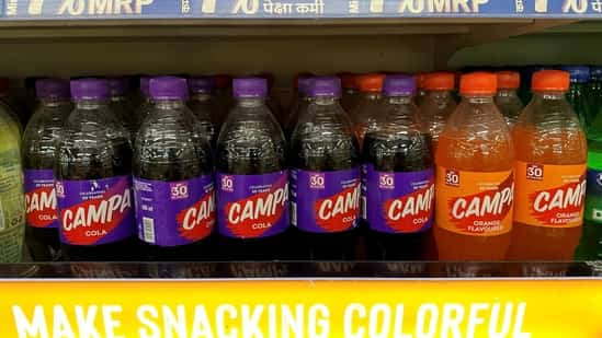 Bottles of Campa Cola are displayed at a Reliance Smart supermarket in Mumbai, on March 20.(REUTERS)