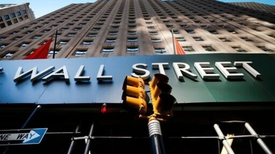 A sign for a Wall Street building is shown, (AP file photo)