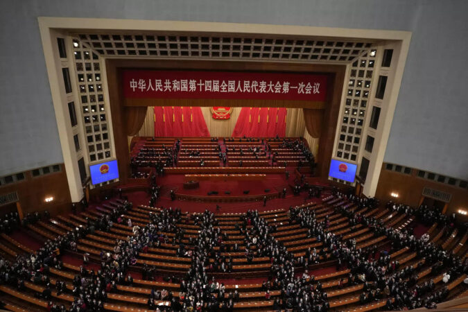 China opens parliament, setting modest growth target of about 5%