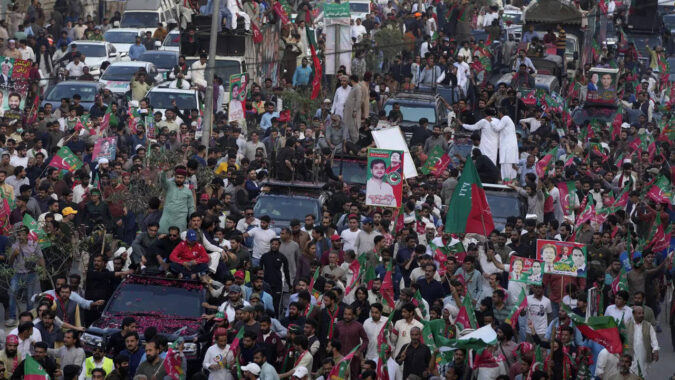 Imran Khan leads thousands at election rally in Lahore as Islamabad police arrive to arrest him