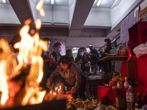 Hong Kong's 'villain hitting' ritual draws crowds