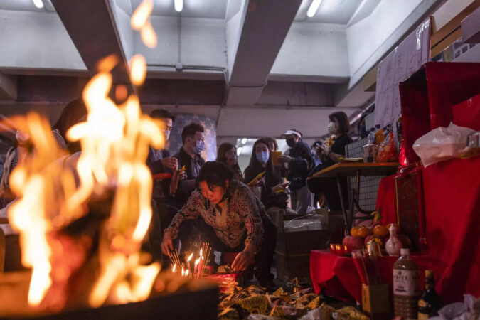 Hong Kong's 'villain hitting' ritual draws crowds