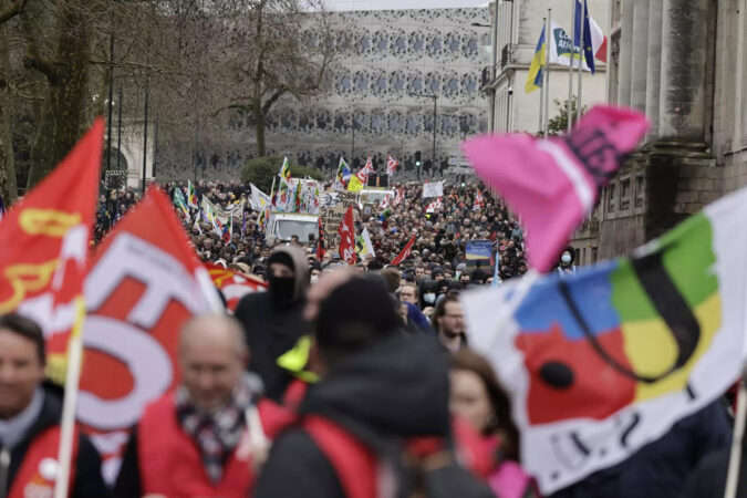 Emmanuel Macron's pension plan advances despite strikes across France