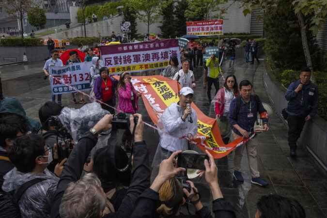 Hong Kong Police Keep Tight Tabs On Protest: Hong Kong police keep tight tabs on first authorised protest in years