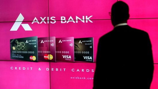 A visitor watches an Axis Bank's advertisement at its corporate headquarters in Mumbai, India July 25, 2017. REUTERS/Danish Siddiqui/File Photo(REUTERS)