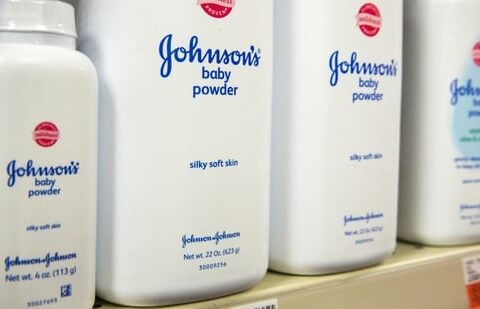 Bottles of Johnson & Johnson baby powder line a drugstore shelf in New York.(REUTERS)