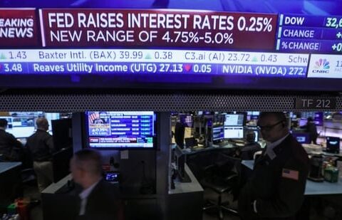 Traders react as a screen displays the Fed rate announcement on the floor of the New York Stock Exchange (NYSE) in New York City, U.S.(REUTERS file photo)