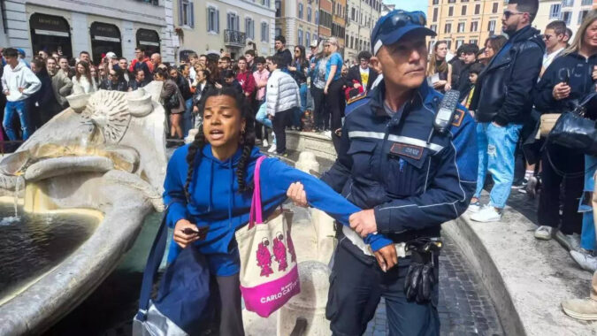 Foreshadowing The End Of The World: Climate activists turn landmark Rome fountain black