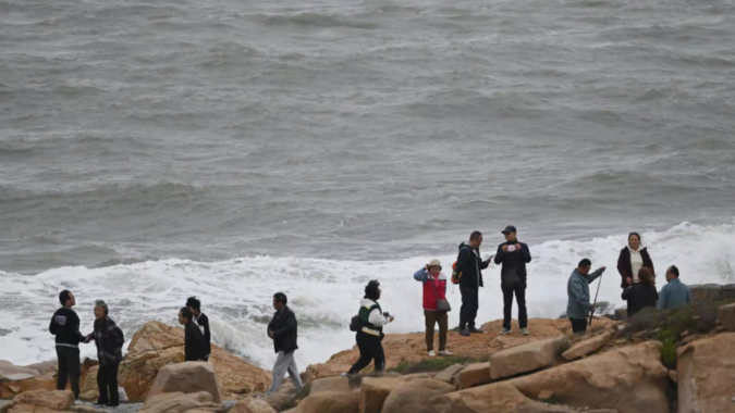 Taiwan: Chinese seaside tourists brush off military drills over Taiwan