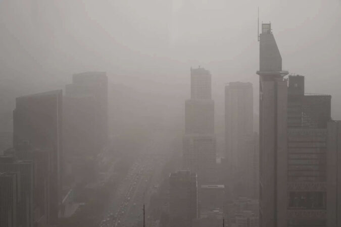 Northern China blanketed with floating sand and dust