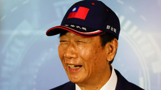 Founder of Taiwan's Foxconn says China won't attack if he's president