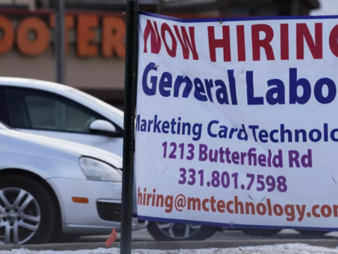 US jobless claims fall again with labor market churning along