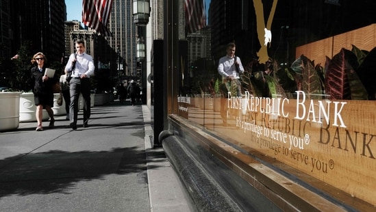 People walk past a First Republic bank in Manhattan on May 01, 2023 in New York City.(Getty Images via AFP)