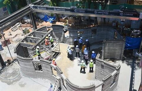 Workers indulge in their work at the construction site of first-of-its-kind 3D printed post office building, in Bengaluru on April 11 (PTI)