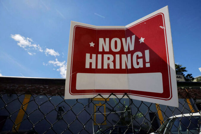 Fed: US adds a strong 253,000 jobs despite Fed's rate hikes