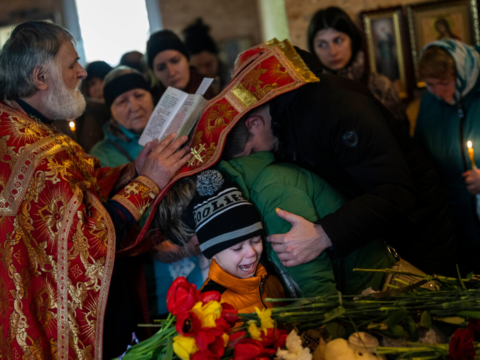 Ukraine: Relatives in Ukraine's Uman bury children killed in Russian missile attack