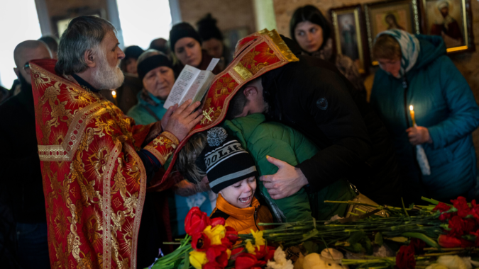 Ukraine: Relatives in Ukraine's Uman bury children killed in Russian missile attack