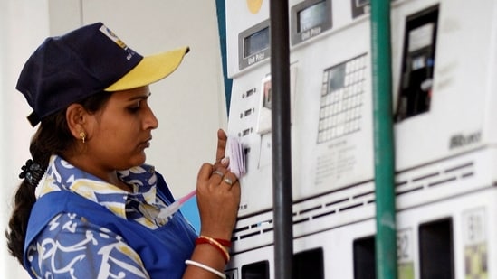 A woman employee works at a petrol pump in Kolkata.(REUTERS/ File)