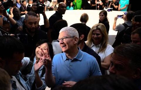 Apple CEO Tim Cook takes a photo in a viewing area for new products during Apple’s Worldwide Developers Conference (WWDC) at the Apple Park campus in Cupertino, California, on June 5. (AFP)