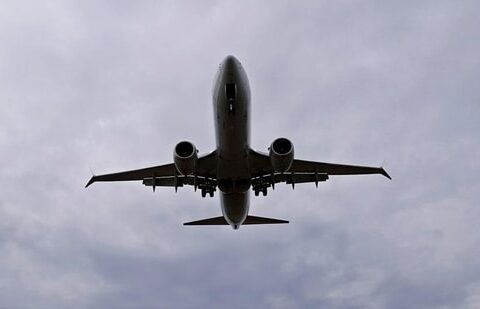 An American Airlines flight approaches for landing.(REUTERS)