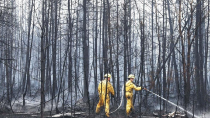 Haze from Canadian wildfires eases as reinforcements from abroad arrive