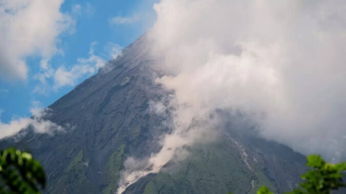 Residents in for months-long displacement as Philippine volcano spews lava, gases