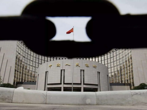 China central bank cuts key interest rate to boost economy