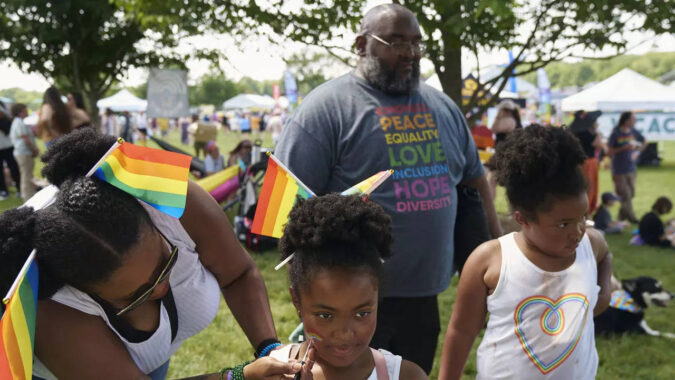 New York: LGBTQ+ Pride revellers flash feathers and flags in the streets from New York to San Francisco