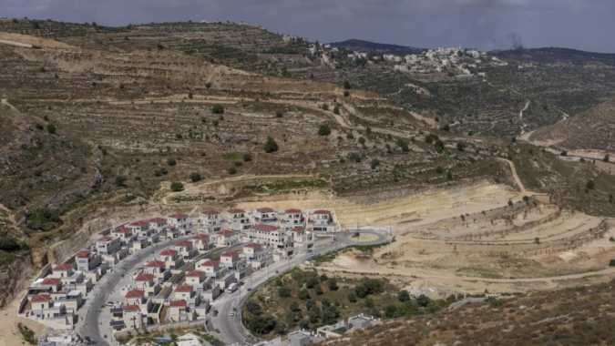 Israel: Israel OK's plans for thousands of new settlement homes, move defies US calls for restraint