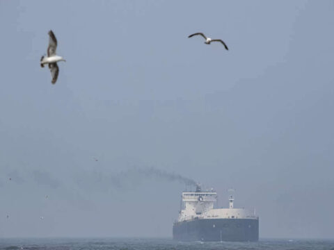 Haze over Great Lakes region reminds US residents that Canadian wildfires persist