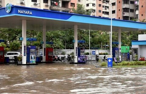 Surat: A waterlogged petrol pump following heavy rainfall,(PTI)