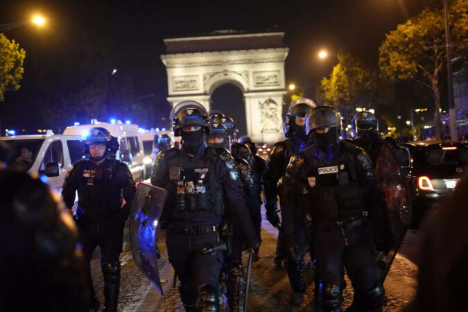 Hundreds arrested on fifth night of France unrest after teen laid to rest