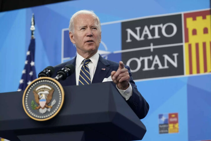 Jens Stoltenberg: Nato summit: Joe Biden hits out at 'craven' Putin