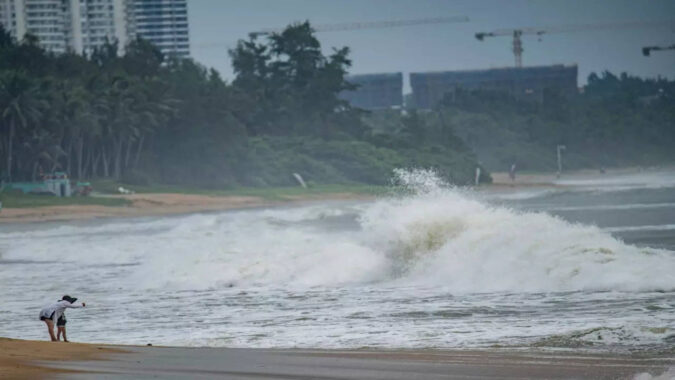 Typhoon Talim leaves behind crushed vehicles, beached whale in southern China