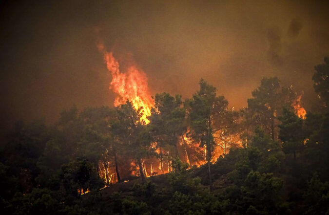 Tourists flee Greek island Rhodes wildfire, thousands evacuated